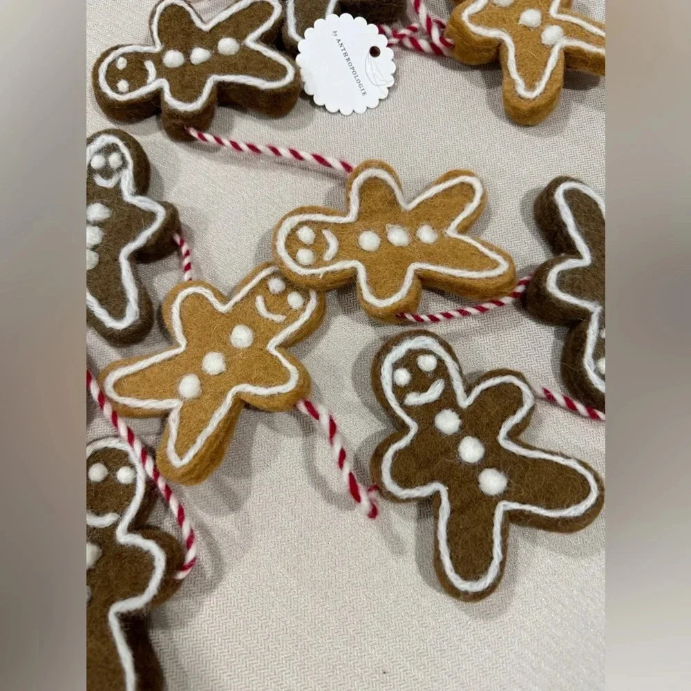 Anthropologie gingerbread men christmas garland wool decor holidays neutral home